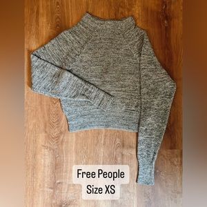Free People mock neck Sweater. Black/white/grey heathered color.